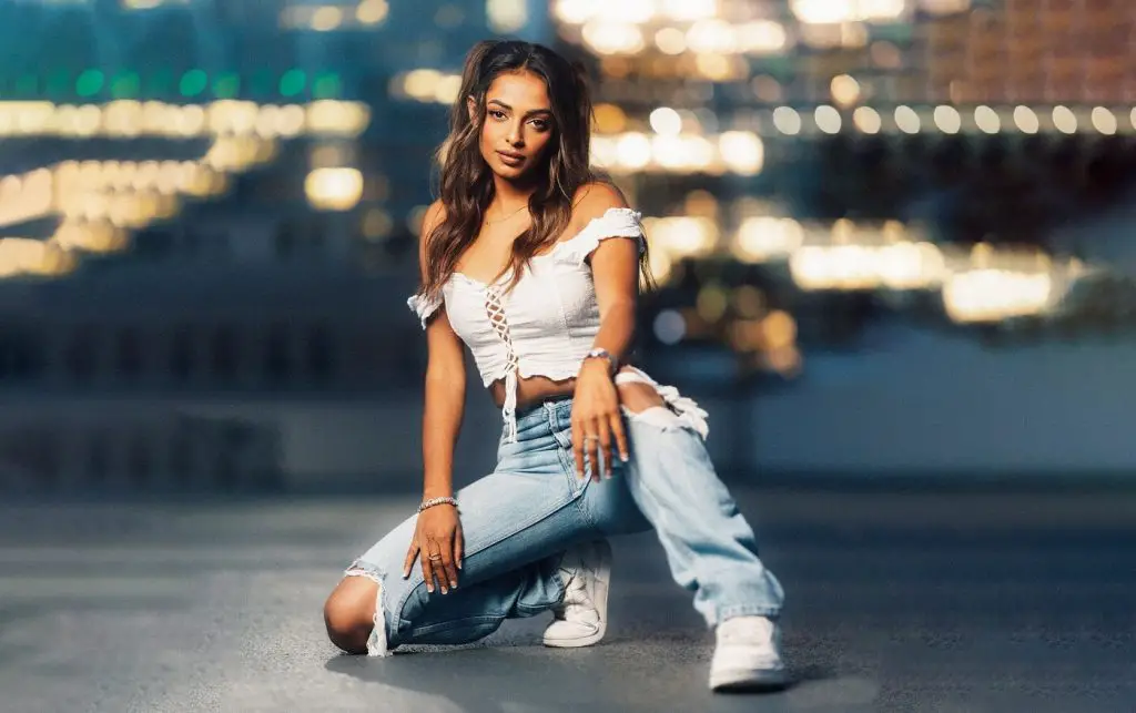 Free: Woman in white shirt posing outdoor during night time - nohat.cc