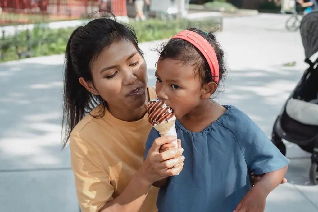 Mom and Daughter Share an Ice Cream